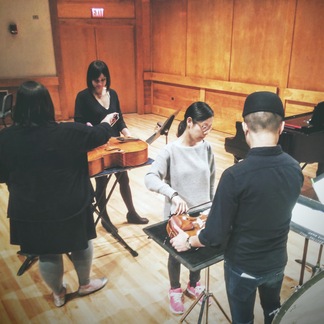 Alison Rowe, Lusha Anthony, Jiwon Kim, and Matthew Lau rehearsing local bond